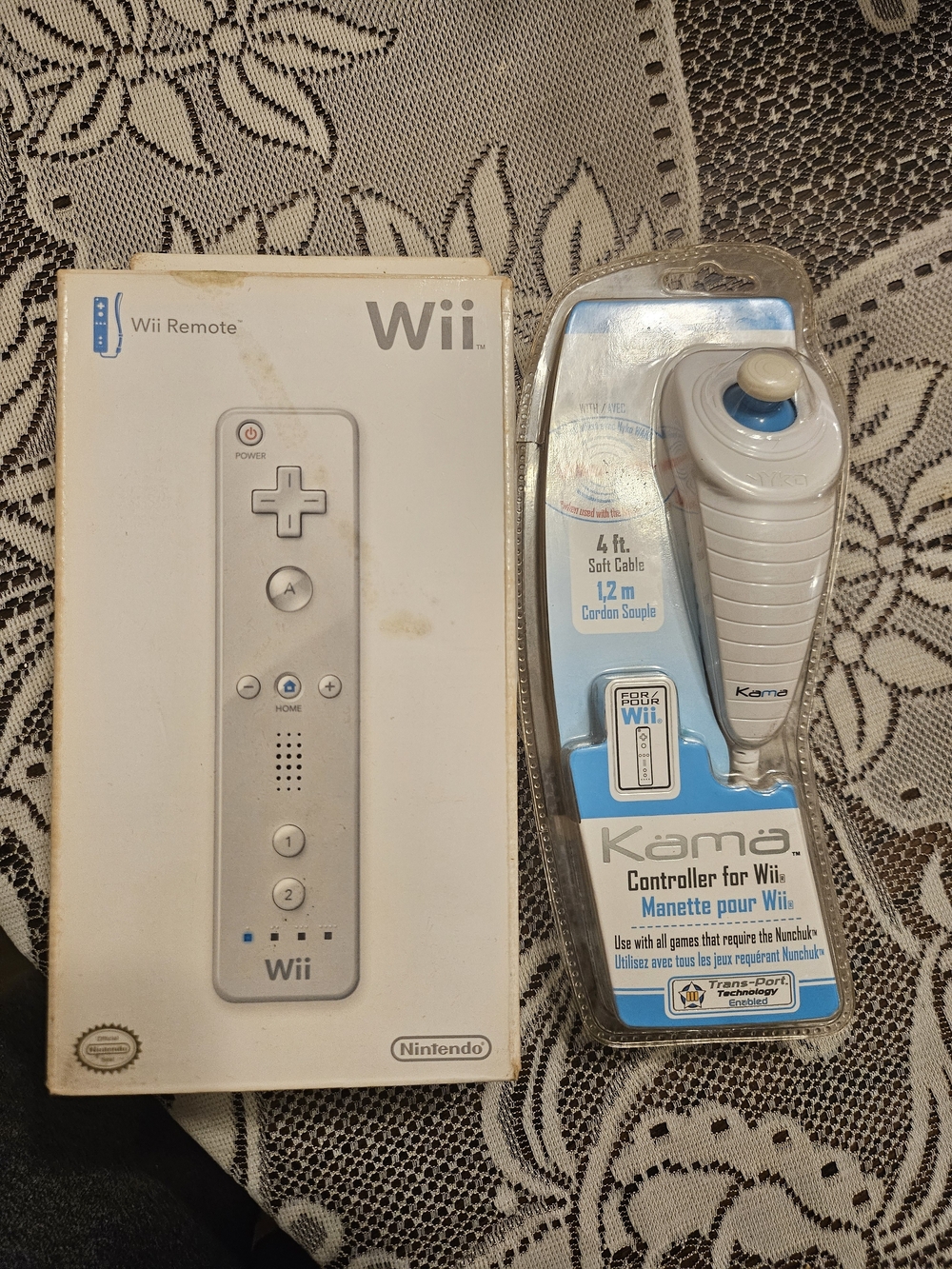 New in Box Offical Wii Remote and NIB Unoffical Nunchuck